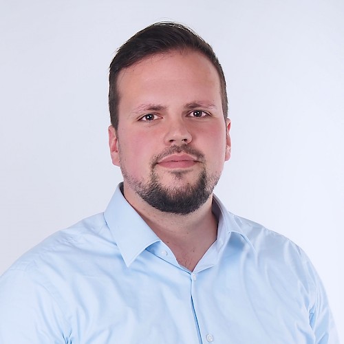 Philip Lorenzi, Business-Division-Leiter